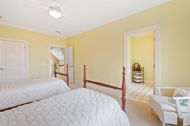 bedroom with ceiling fan, carpet, baseboards, and ornamental molding