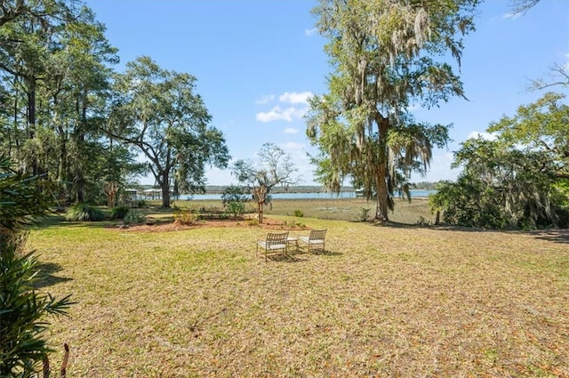 view of yard with a water view