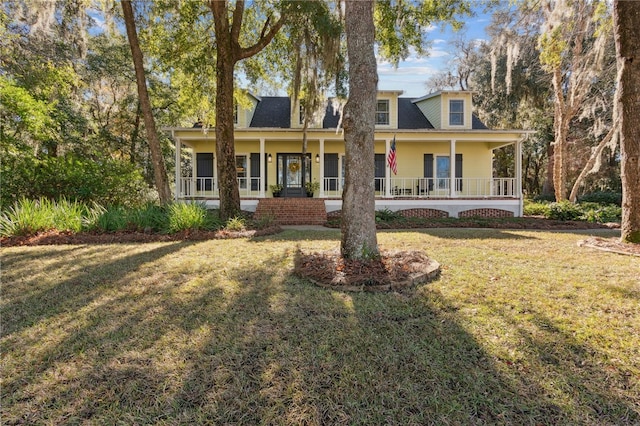 view of front of home featuring a porch and a front yard