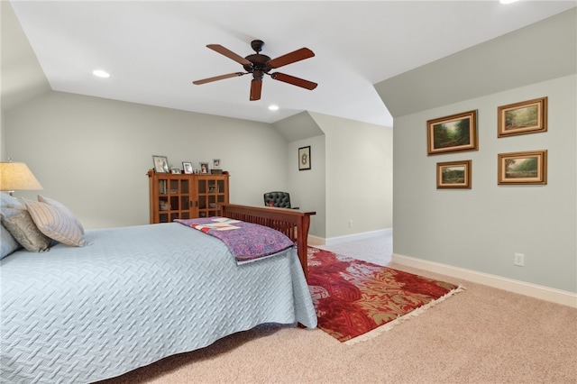 bedroom featuring carpet flooring, ceiling fan, and vaulted ceiling