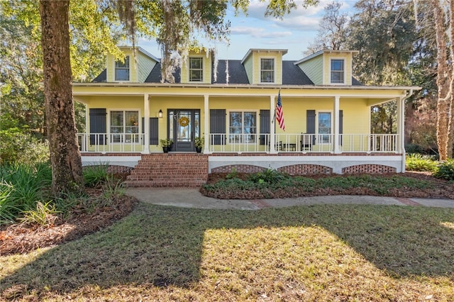 view of front of property with a front lawn and a porch