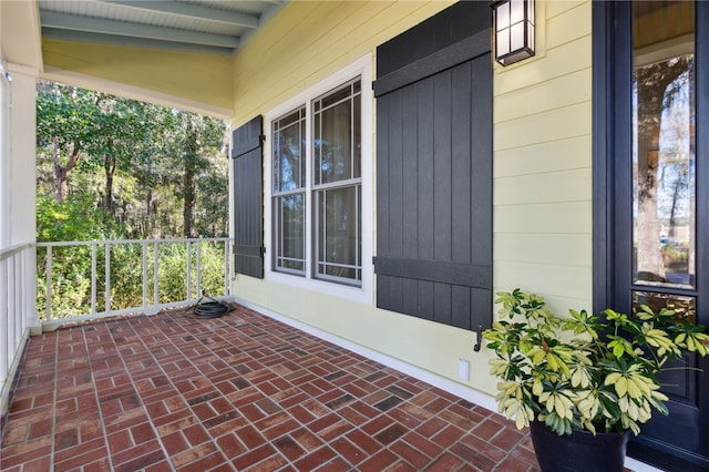 view of patio featuring covered porch