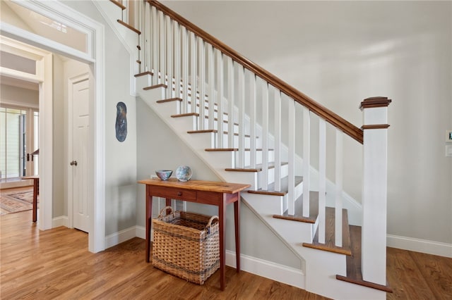 stairway with wood-type flooring