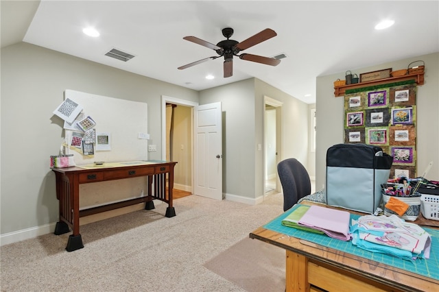 office featuring ceiling fan, light colored carpet, and vaulted ceiling