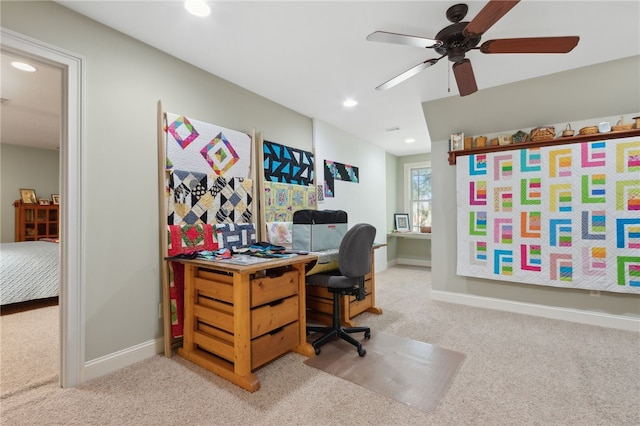 home office with carpet flooring and ceiling fan