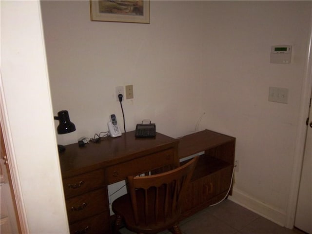 office area featuring tile patterned flooring and baseboards