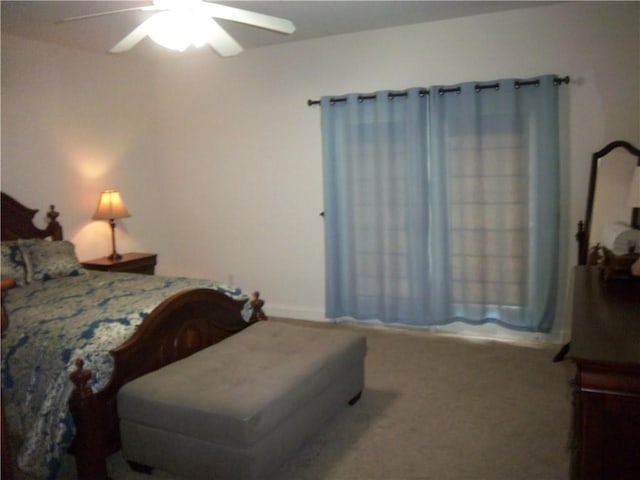 bedroom featuring carpet floors and a ceiling fan