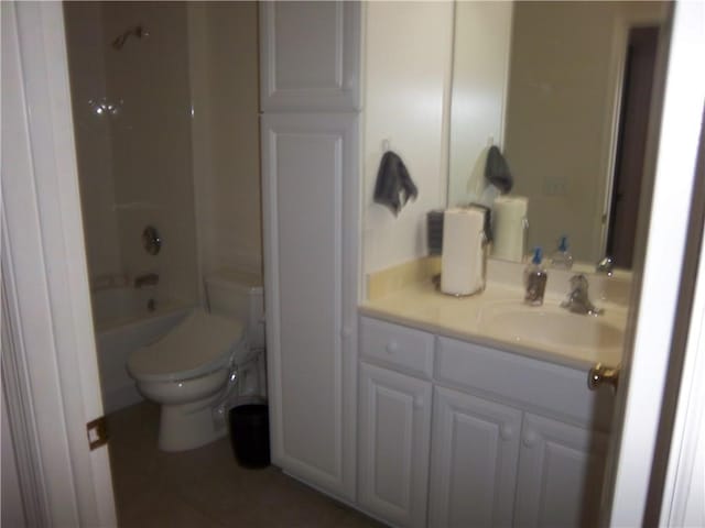 full bath with toilet, tile patterned floors, vanity, and shower / tub combination