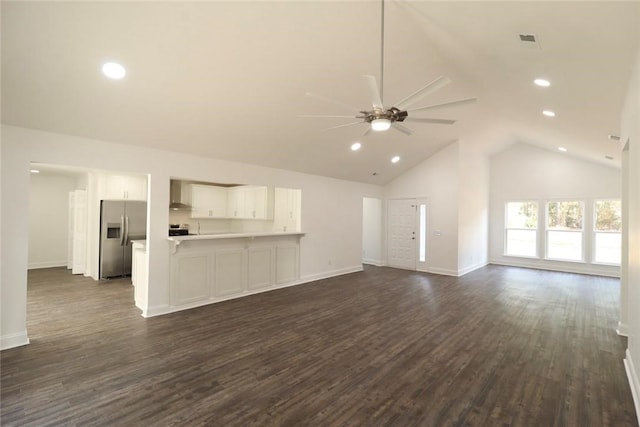 unfurnished living room featuring ceiling fan, dark wood-type flooring, and high vaulted ceiling