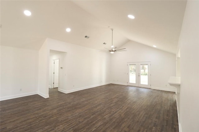 unfurnished living room featuring french doors, ceiling fan, dark hardwood / wood-style flooring, and vaulted ceiling