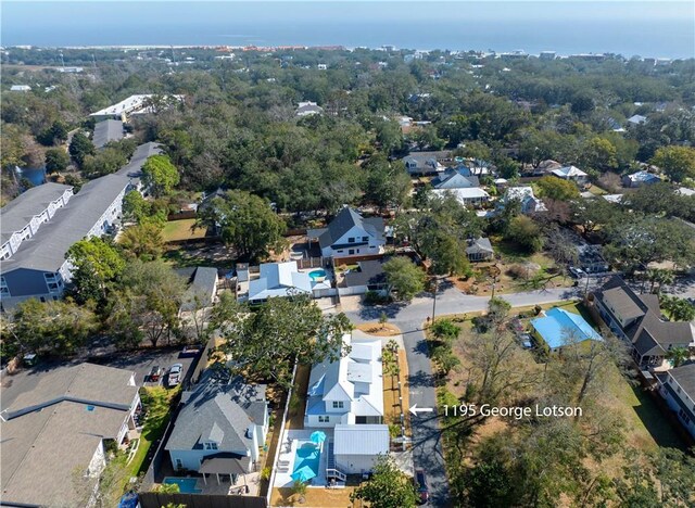 birds eye view of property with a residential view