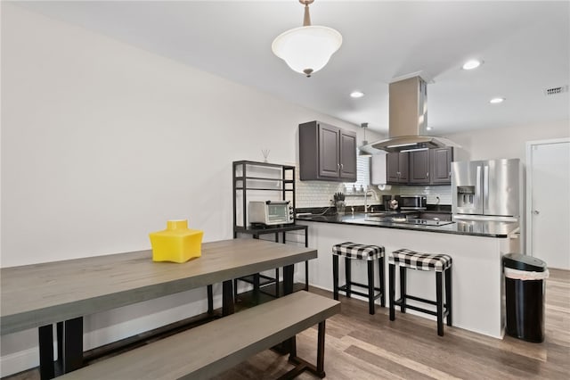 192 W Maple Ave, Kingsland, GA 31548 - dining room with light wood-type flooring and recessed lighting