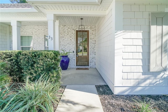 doorway to property with covered porch