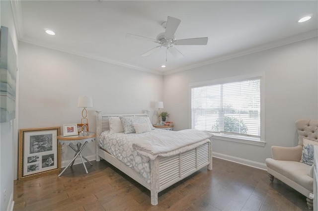 bedroom with ceiling fan, crown molding, and dark wood-type flooring