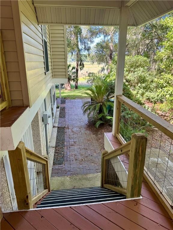 1356 Fiddler Trce NE, Townsend, GA 31331 - wooden deck with a patio area