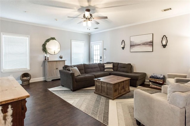 living room featuring crown molding, ceiling fan, and dark wood-type flooring