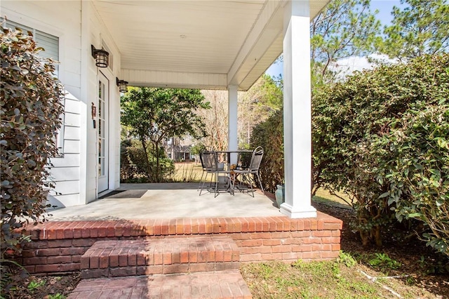 view of patio featuring a porch