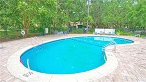 800 Mallery St Unit 3, Saint Simons Island, GA 31522 - community pool featuring a patio area