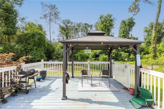 deck with a gazebo and area for grilling