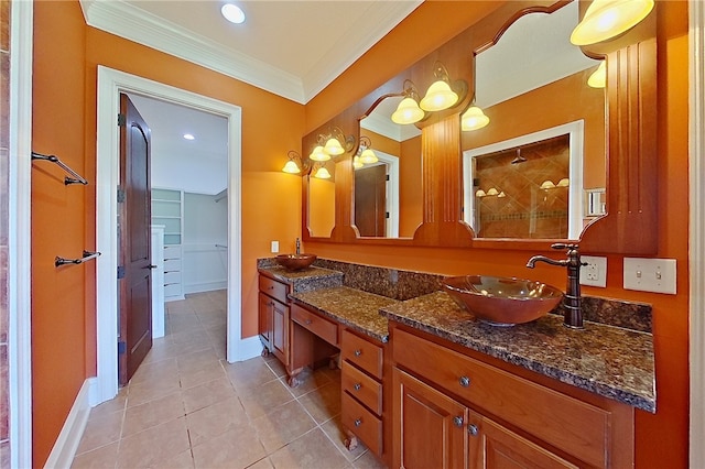 4949 Trudie Rd, Blackshear, GA 31516 - full bath featuring ornamental molding, vanity, a tile shower, tile patterned flooring, and a walk in closet