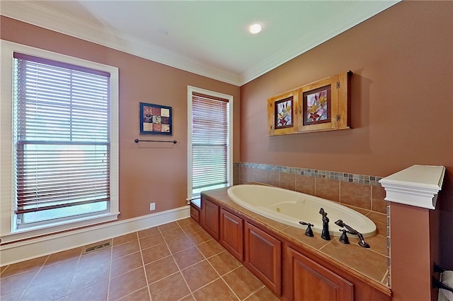 4949 Trudie Rd, Blackshear, GA 31516 - bathroom with a tub with jets, tile patterned floors, and ornamental molding