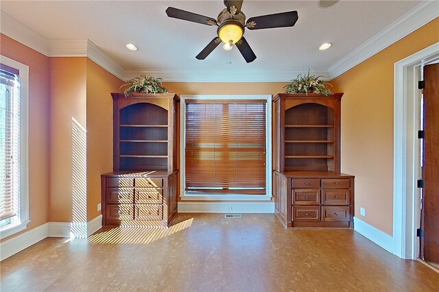 4949 Trudie Rd, Blackshear, GA 31516 - unfurnished living room featuring healthy amount of natural light, ornamental molding, a ceiling fan, and recessed lighting