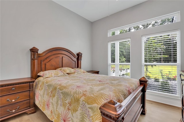 bedroom with light hardwood / wood-style floors