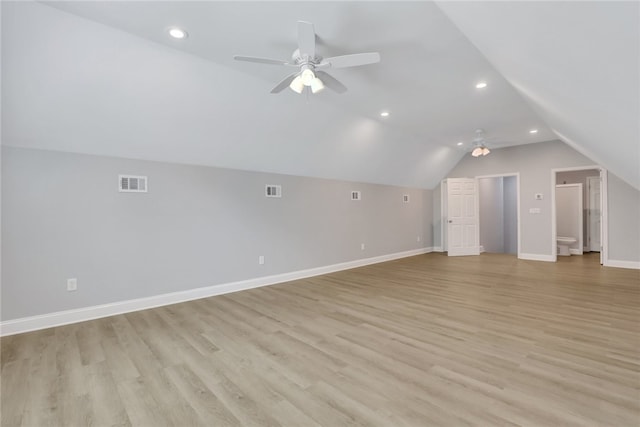 bonus room with light hardwood / wood-style flooring, ceiling fan, and lofted ceiling