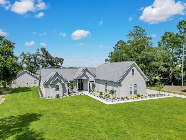 view of front of home with a front lawn