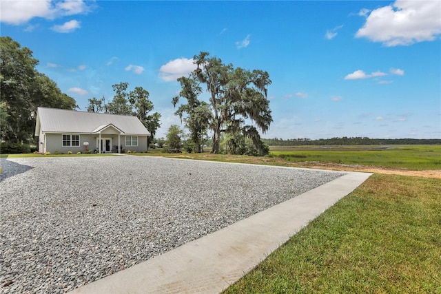 exterior space with a front lawn