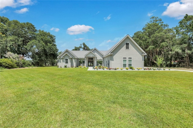 view of front of property with a front lawn