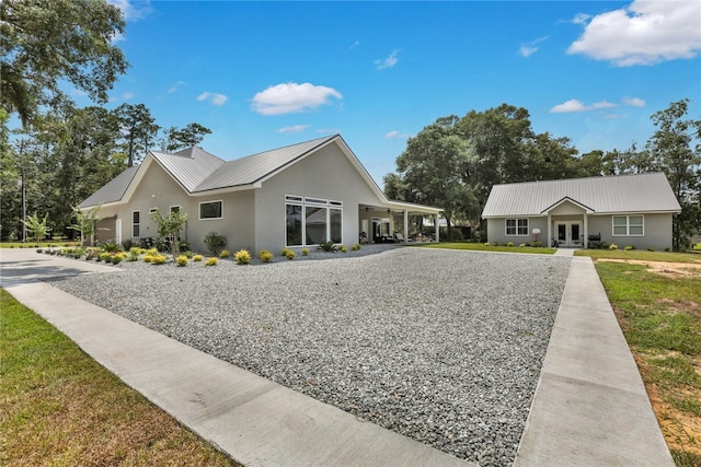 view of front of house featuring a carport