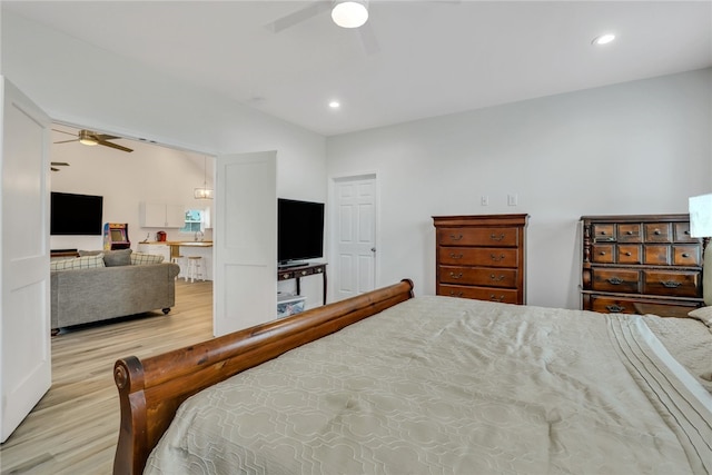 bedroom featuring light hardwood / wood-style floors and ceiling fan