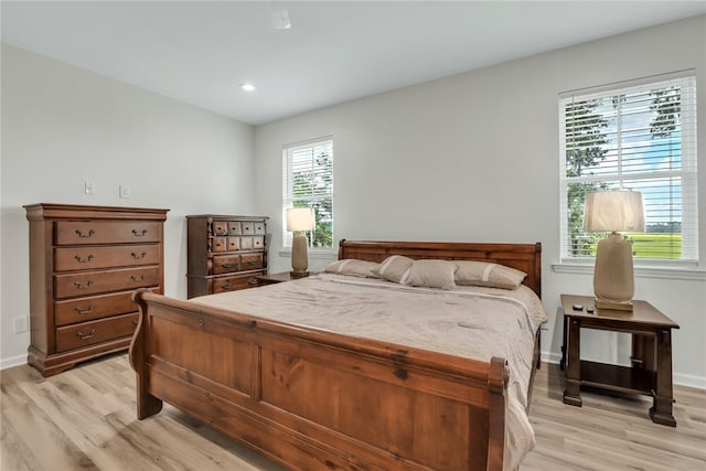 bedroom with light hardwood / wood-style flooring