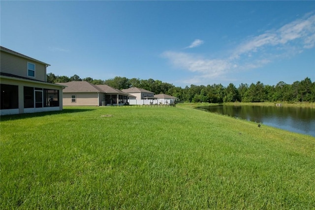 200 Pistachio Ln, Kingsland, GA 31548 - view of grassy yard with a water view and a sunroom