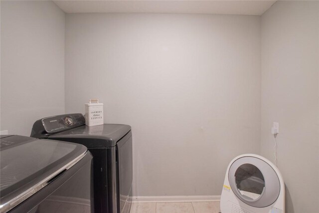 200 Pistachio Ln, Kingsland, GA 31548 - laundry room featuring separate washer and dryer and light tile patterned floors