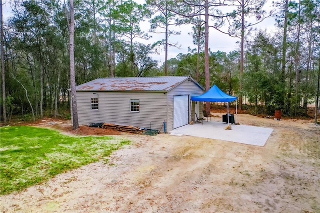 view of outdoor structure with a garage