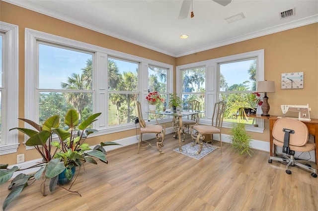126 Riverwalk Dr, Brunswick, GA 31523 - sunroom with ornamental molding, wood finished floors, baseboards, healthy amount of natural light, and recessed lighting