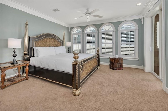 bedroom featuring crown molding, light colored carpet, and ceiling fan