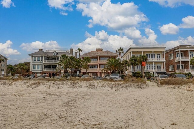 view of front of property with a water view