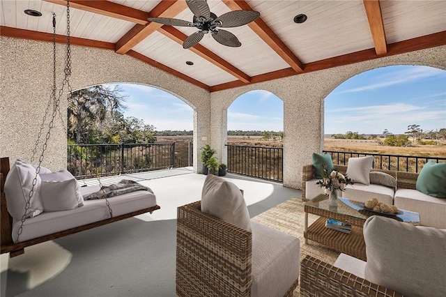 view of patio featuring ceiling fan and outdoor lounge area