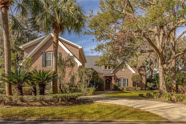 view of front of home with a front lawn