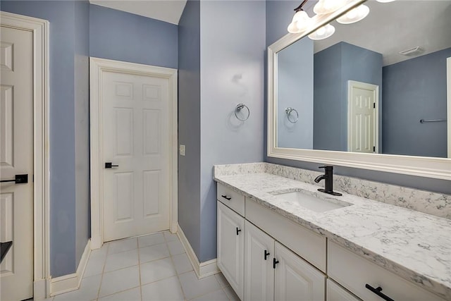 bathroom featuring vanity and tile patterned flooring