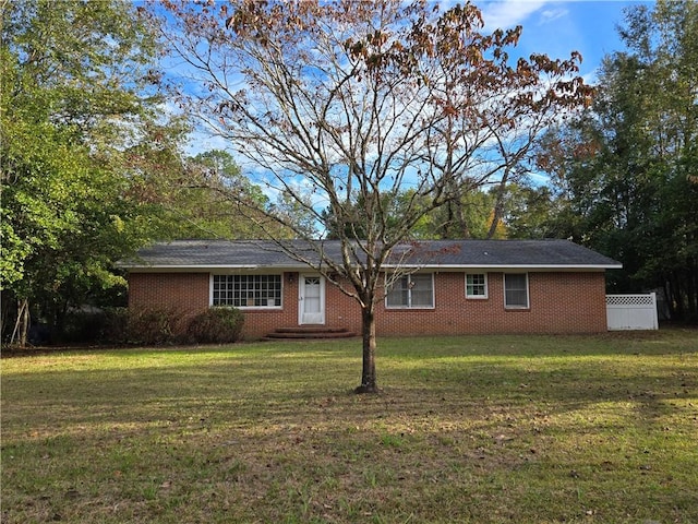 view of front of home with a front lawn