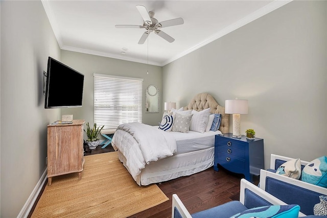 bedroom featuring ornamental molding, wood finished floors, a ceiling fan, and baseboards