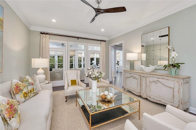 living area featuring light wood-style floors, ceiling fan, crown molding, and recessed lighting