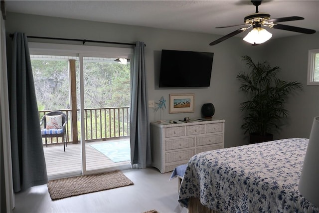 bedroom featuring access to outside and ceiling fan