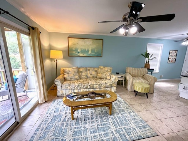 tiled living room with crown molding, ceiling fan, and a healthy amount of sunlight