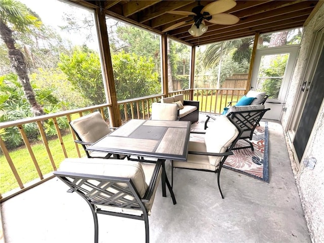 sunroom / solarium with ceiling fan