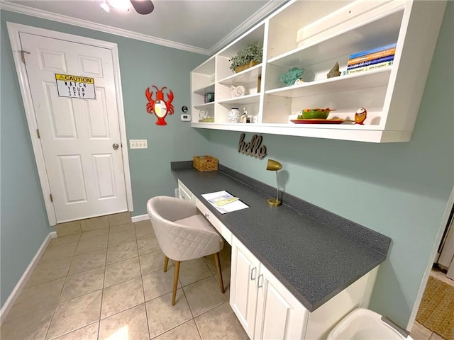 tiled home office featuring crown molding